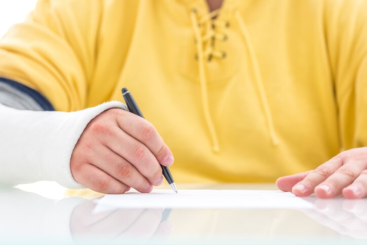 Man Writing - Liability Claims Attorney in Philadelphia, PA