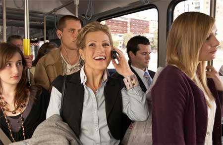 Businesswoman on call—public transportation in Ottumwa, IA