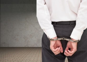 Businessman Wearing Handcuffs - Bankruptcy Attorney in Windham, ME