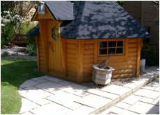 Childs garden shed on a patio
