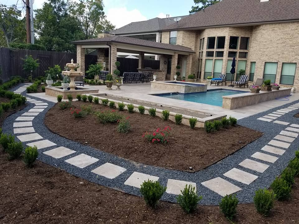 A large house with a large swimming pool in the backyard.