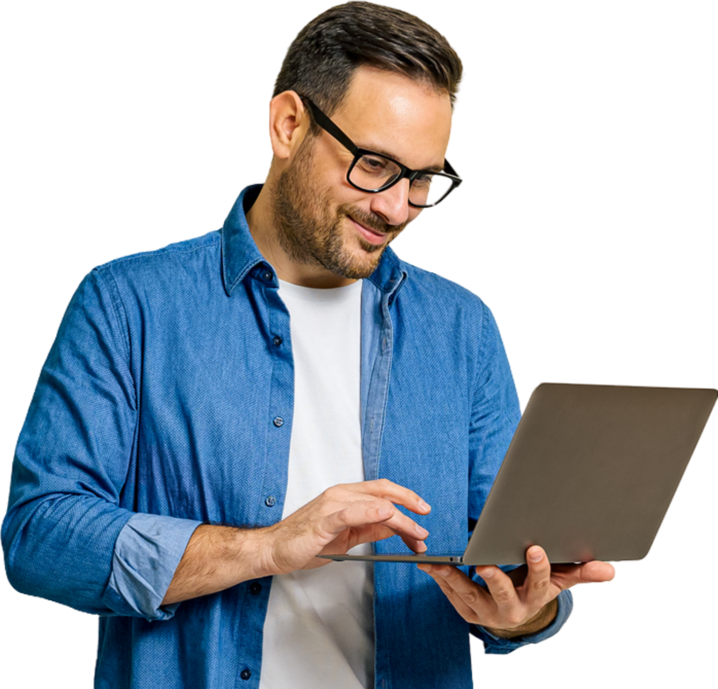 A man wearing glasses is using a laptop computer.