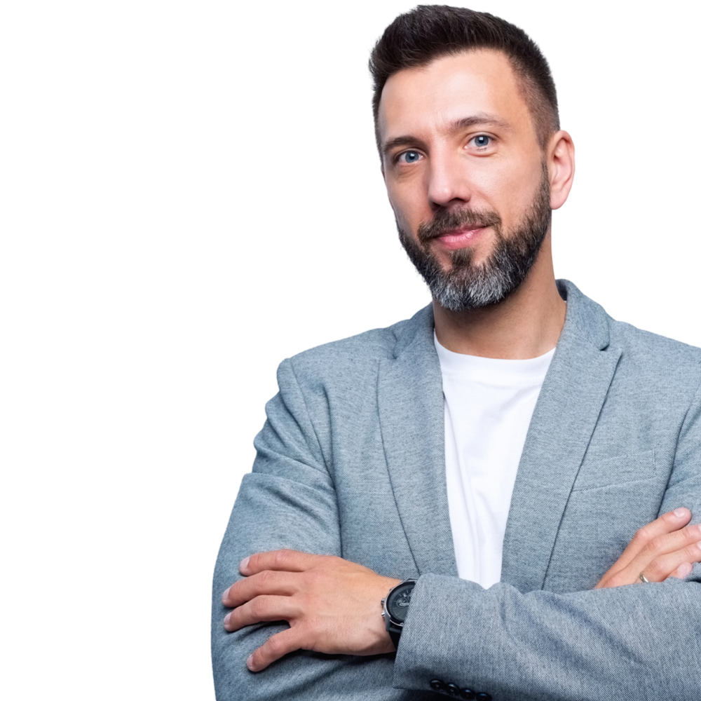 A man in a suit with his arms crossed